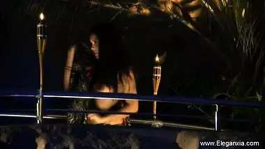 Sexy exotic girl strips outdoors