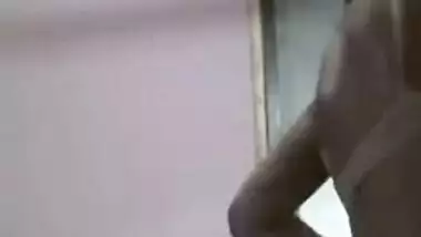 Woman shows XXX boobs before putting a sex bra on in front of Desi cam