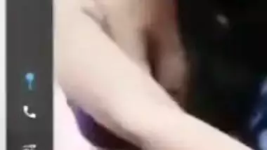 Showing her hanging boobs