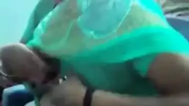 Horny Indian female un green helps man relax touching her XXX boobs