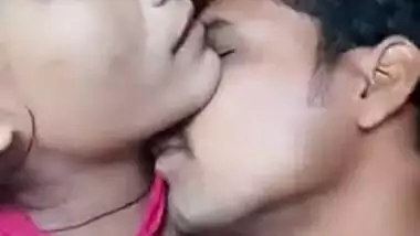 Young Desi woman is lying in bed with XXX lover kissing her on camera