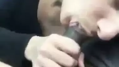 A nude Indian babe drinks her lover’s cum in the car